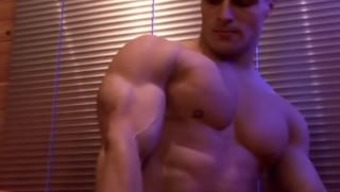 posing gay male bodybuilder